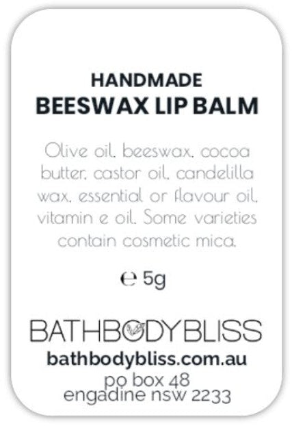 Handmade beeswax lip balm label with product details and brand information.