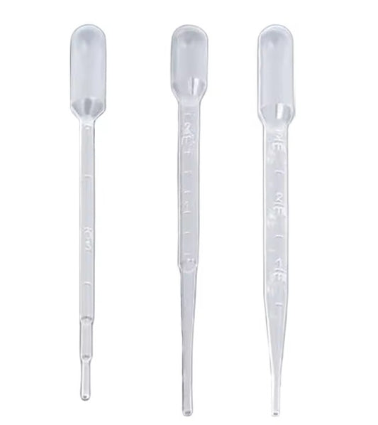 Three clear plastic pipettes on a white background