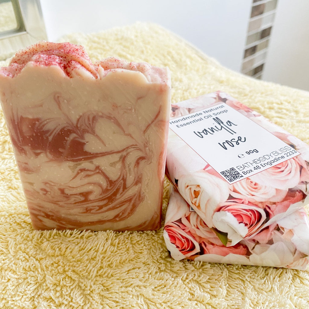Bar of soap with a floral design on a yellow towel