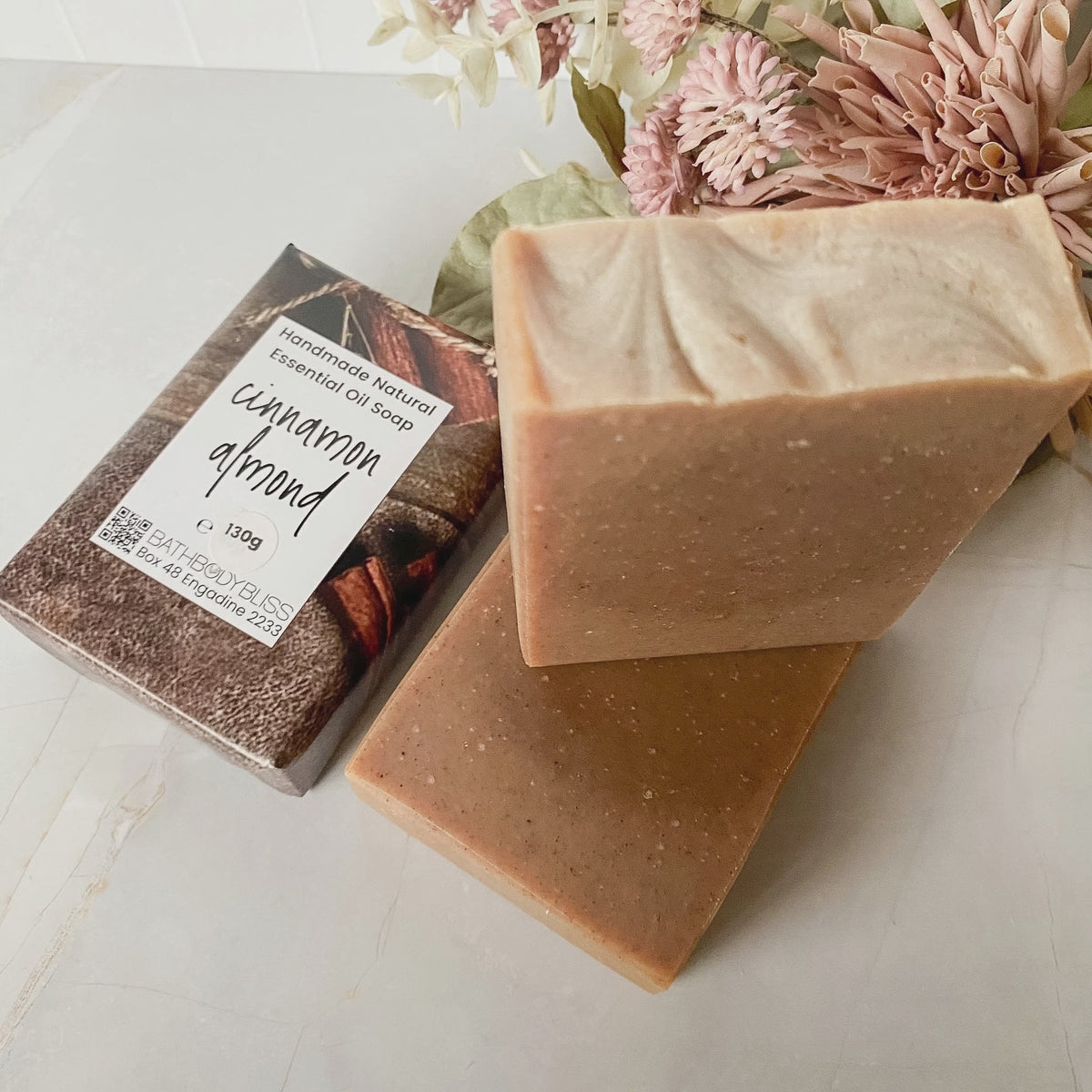 animated image of wrapped and unwrapped bars of Cinnamon Almond handmade soap by bathbodybliss